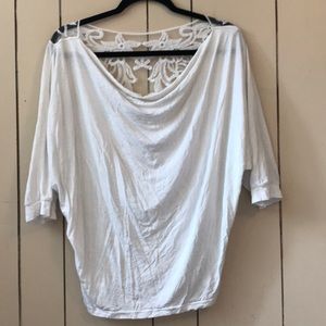 White and lace shirt.